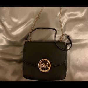 Gold and black MK purse